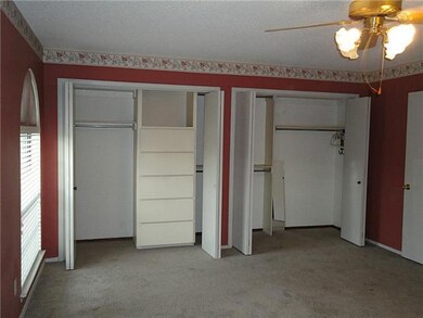 bedroom with dual closet