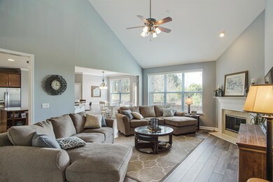 Living room open to kitchen and breakfast room.