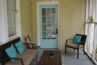 cozy screened front porch