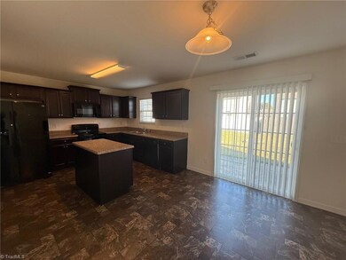 1907 Northrop Dr, Whitsett, NC 27377 - photo 6