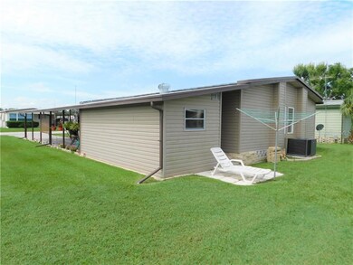 Back of home has small patio area.