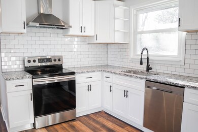Gorgeous tile back splash and beautiful granite counter tops  