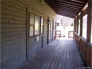 Porch - Open. Front of house (west side)