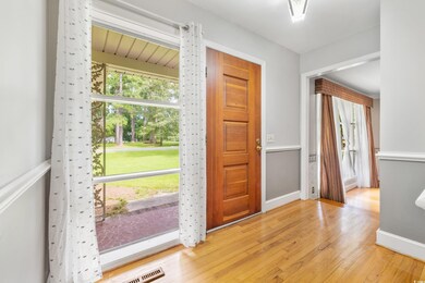 Foyer entrance featuring light wood-type flooring