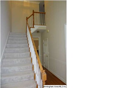 Elegant staircase to three very large bedrooms and
