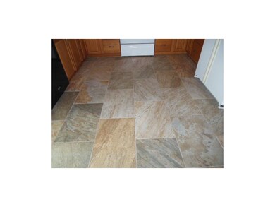 Tile floor in kitchen.