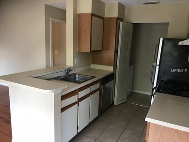 Laundry room off kitchen.