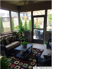 Screened in patio with television hookup.