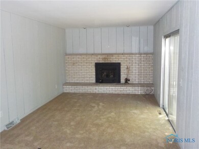 Family Room with woodturning fireplace
