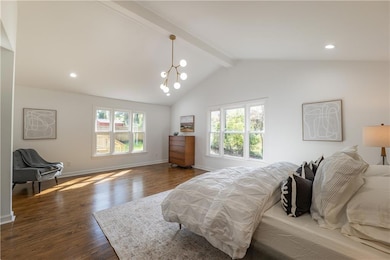 The oversized primary wing offers true sanctuary with a hallway door that closes it off from the rest of the house for ultimate privacy.