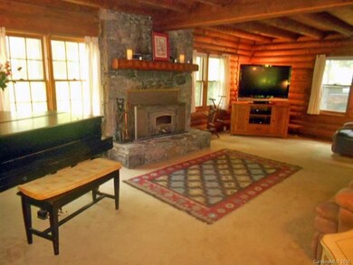 Living room with rock fireplace