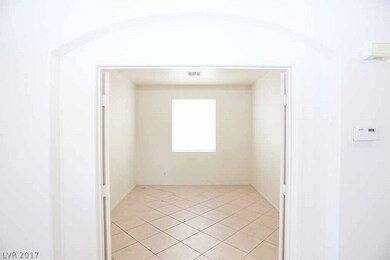 Large den downstairs with double doors