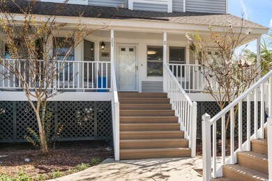 Property entrance featuring covered porch