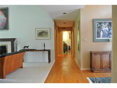 Hardwood flooring in Foyer, Hallway & Kitchen. New