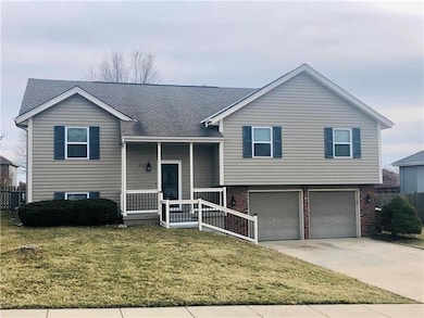 411 Blue Grass Dr, Raymore, MO 64083 - photo 2