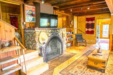 Living room with rock fireplace