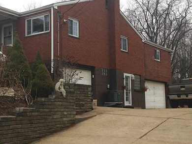 Parking Lot/Garage. Two separate Auto-Door Garages