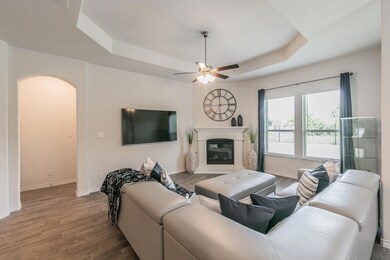Living room featuring wood-type flooring, ceiling 