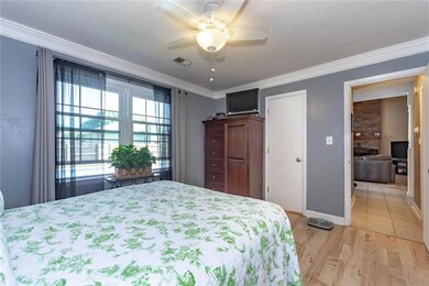 LAMINATE - CEILING FAN - SECLUSION IN THIS MASTER BEDROOM ON LOWER LEVEL ...