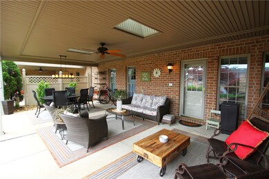Kitchen Door leads to 16x30 Covered Back Patio w/