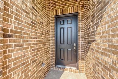 Beautiful entryway along with an expansive covered