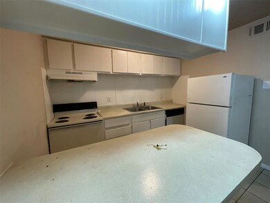 Pictured is interior of unit #2 in Elm St building