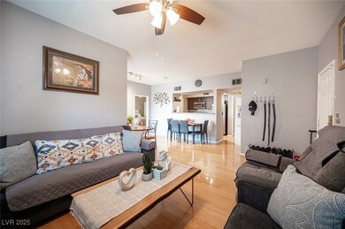 Living area featuring light wood-type flooring, ra