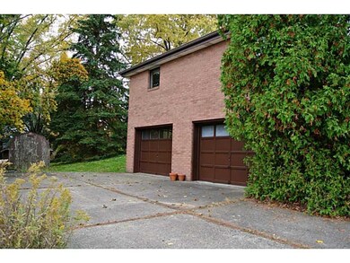 Parking Lot/Garage. Garage and utility shed.