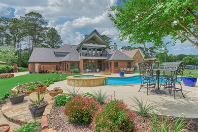 The home feature a custom saltwater pool with extensive deck and professional landscaping.