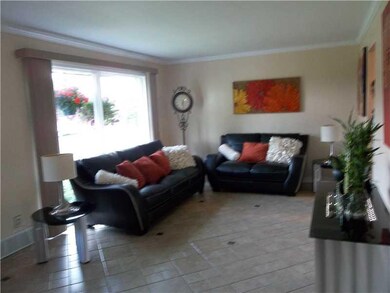 Living Room. Unique stone flooring in living room 