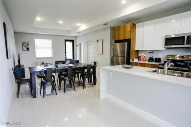 Kitchen featuring stainless steel appliances, ligh