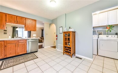 Laundry conveniently located on main level and boa