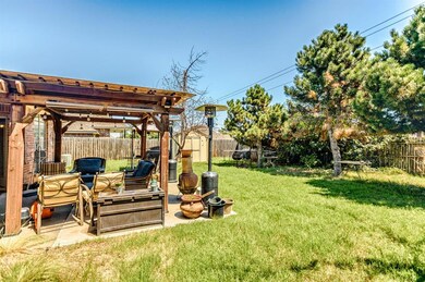 View of yard with a patio area and a pergola