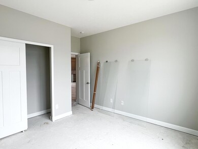 Main level guest suite with adjacent 3/4 bath perfect for visitors, or a multi-purpose space.