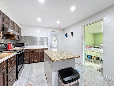 7717 Clarcona Ocoee Rd, Orlando, FL 32818 - photo 7