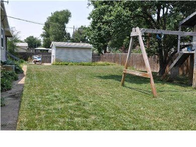 Nice size back yard with sidewalks along the north