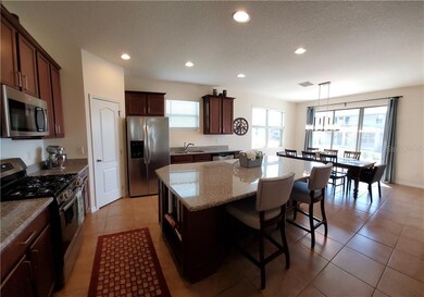 Kitchen with island and dining room