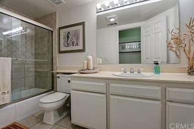 Hall bath by the other two bedrooms for your guests. Note the tile backsplash in the bathtub/shower.