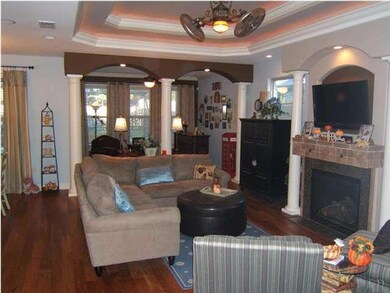 Great room - note the distressed hardwood floors.
