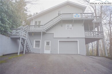Rear of house showing Garage and Golf Cart parking