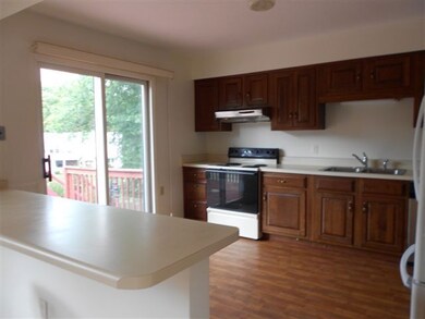kitchen w/view of sliding doors to deck