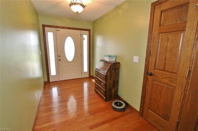 Foyer with wood floors