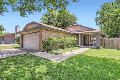 View of front of house featuring brick siding, dr