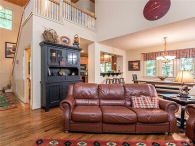Great room looking to dining area & kitchen