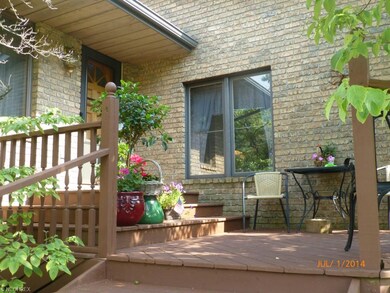 The front entry wraps around the side of the home 