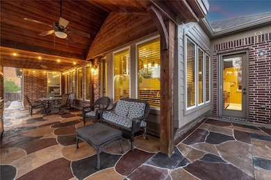 Patio terrace at dusk with a patio, ceiling fan, and outdoor dining area