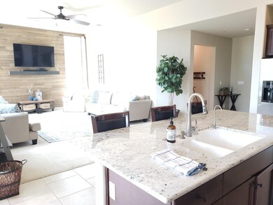 Kitchen opens to living room