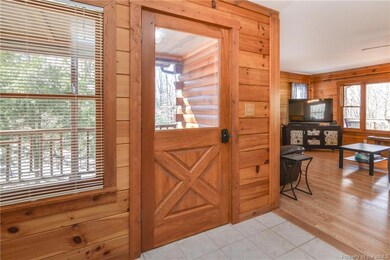 Foyer has beautiful tile floors and view outside