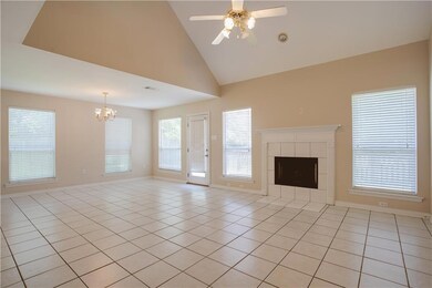 Living room and dining room view. Plenty of window