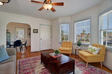 notice the archway leading to the dining room